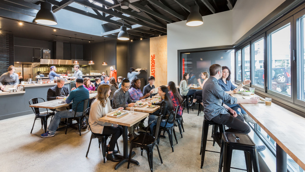 A group of people sitting at a table.