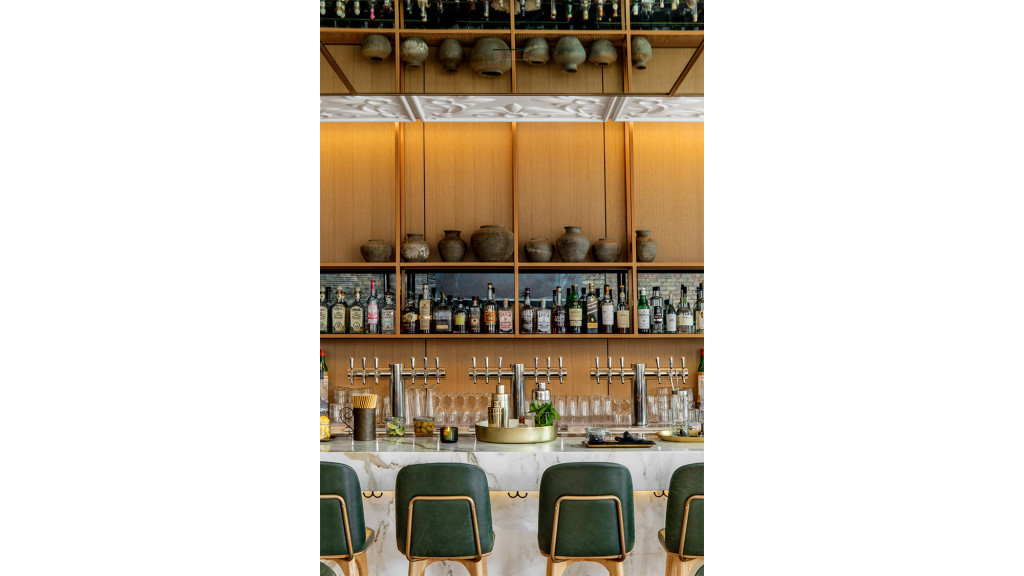 A table with bottles of wine on it.