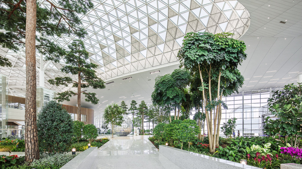 A building with trees and plants.
