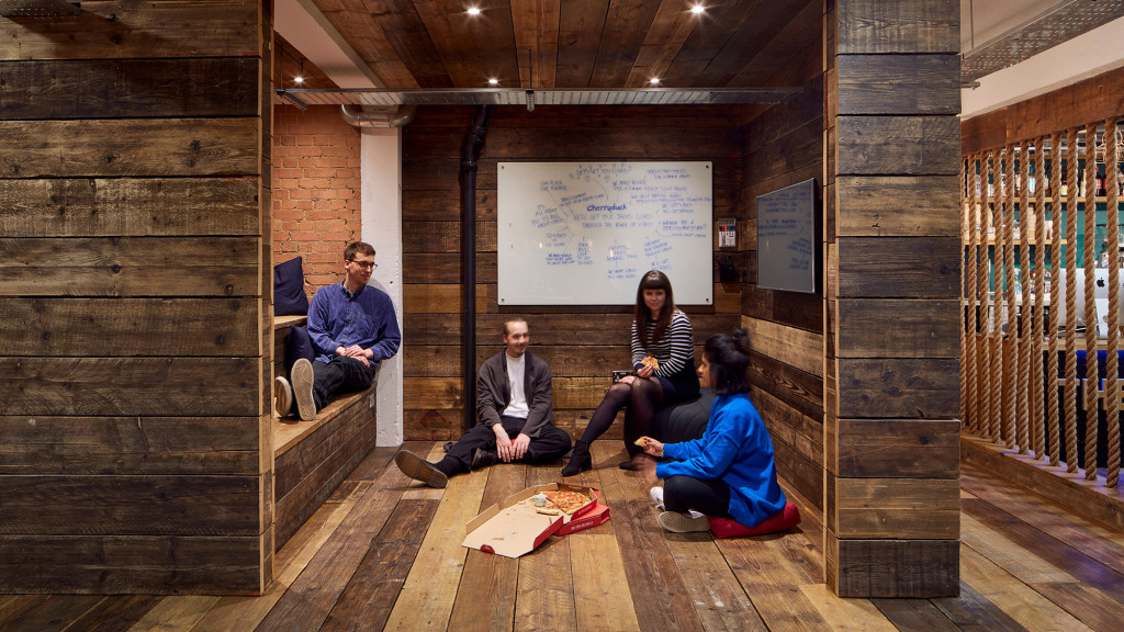 A group of people sitting in a room.
