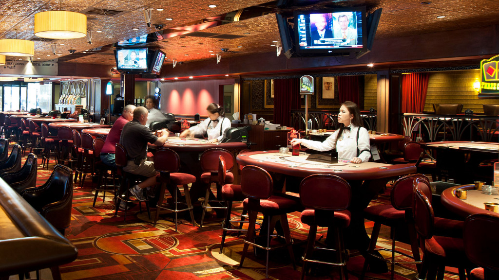 People sitting at tables in a restaurant.