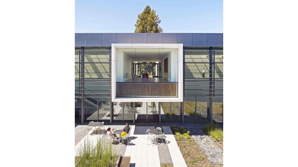 A building with a glass front.