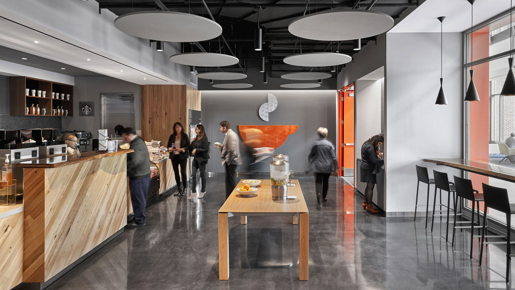 A group of people in a room.