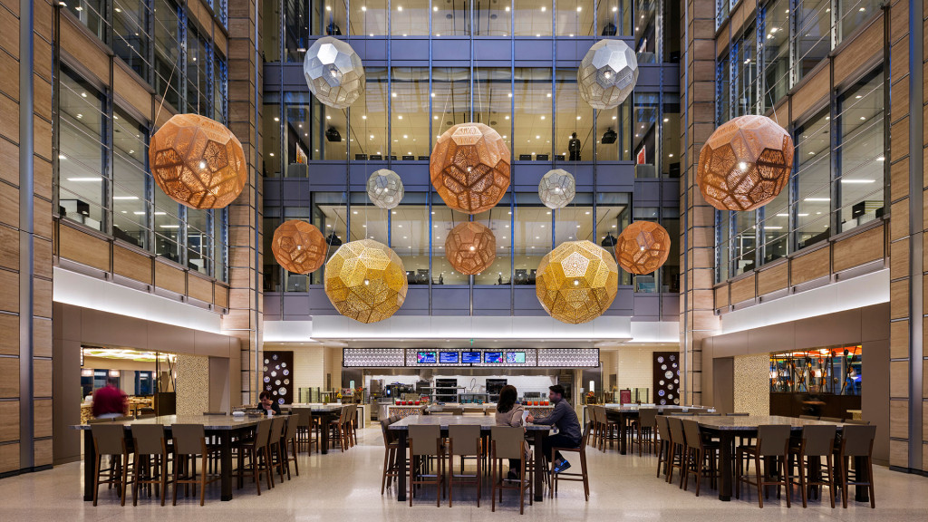 A large room with tables and chairs.