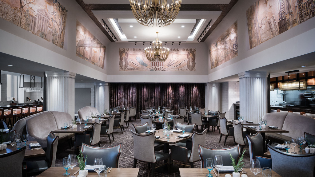 A room with tables and chairs.