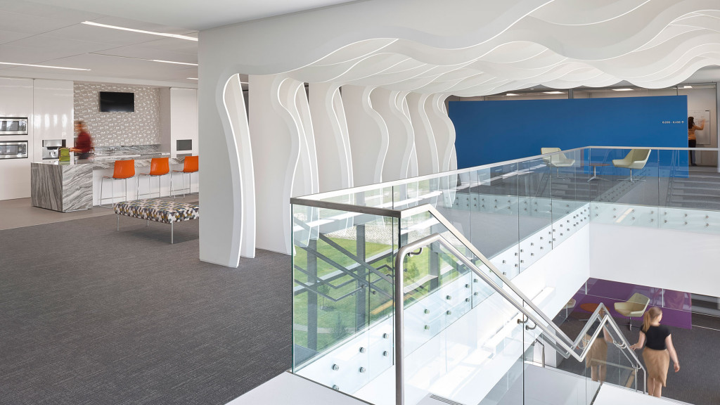 A person walking down a hall.