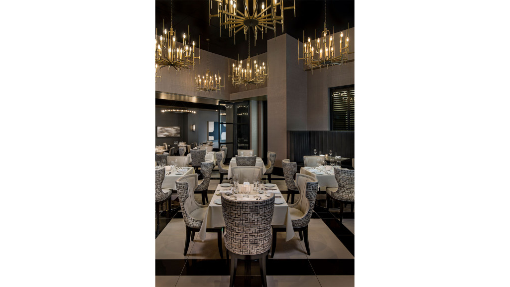 A room with tables and chairs.