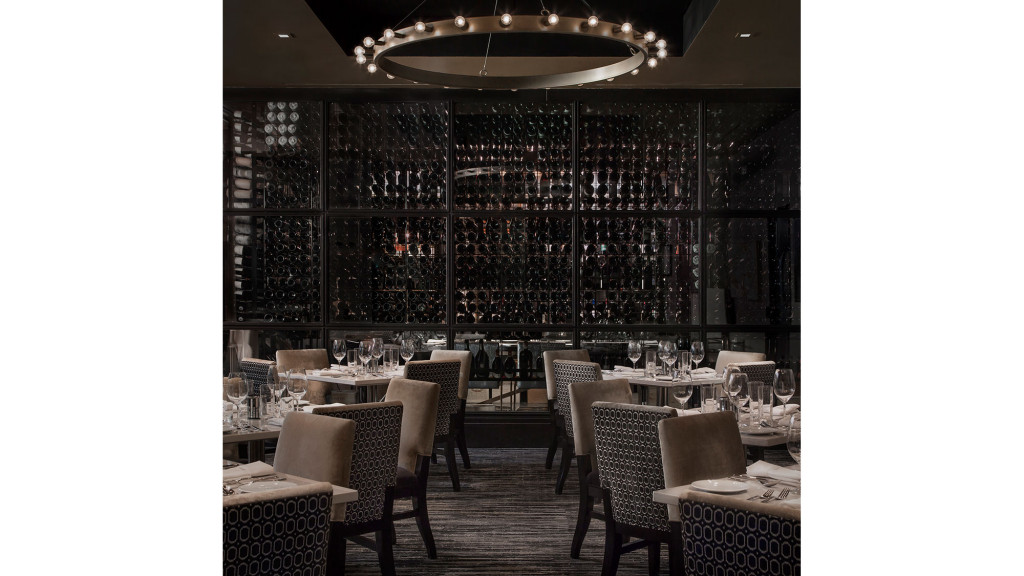 A room with tables and chairs.