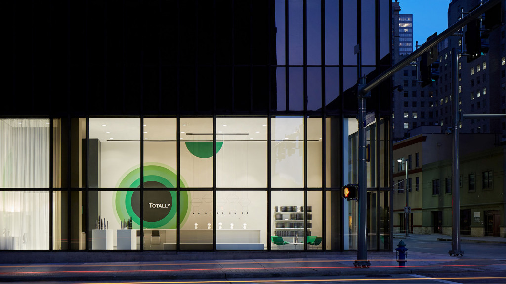 A building with a large glass window.