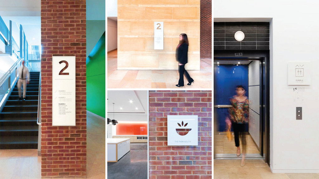 A few people walking into a building.