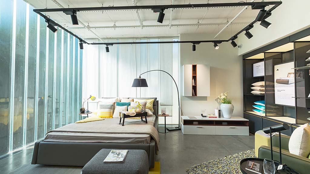 A room with a bed and a couch.