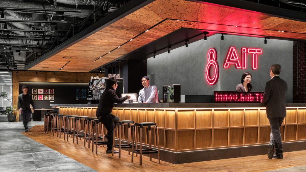 A group of people at a bar.