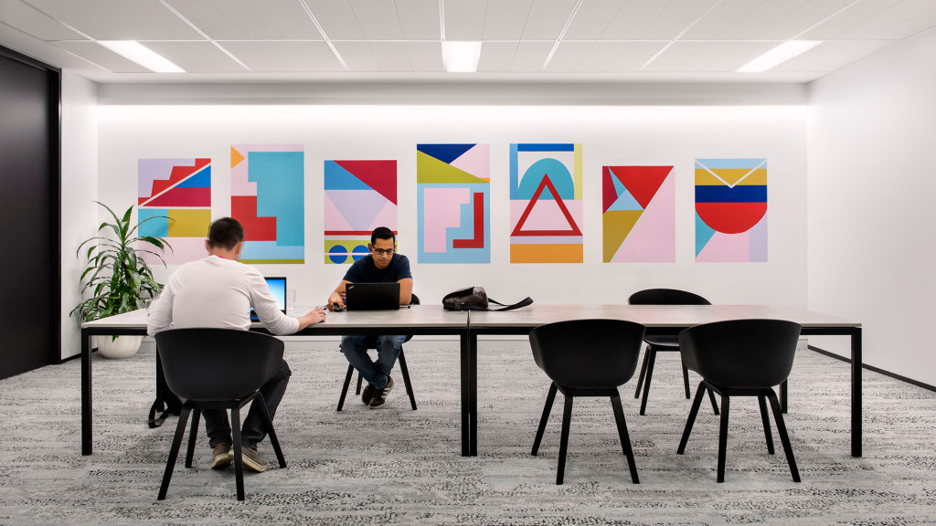 Men sitting at a table.