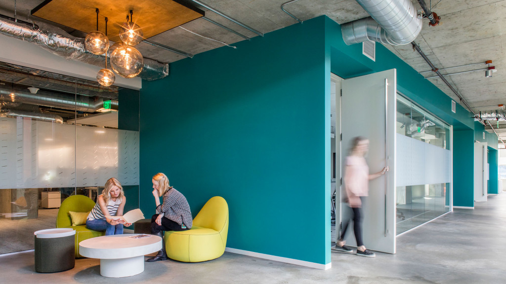 A few women sitting in a room.