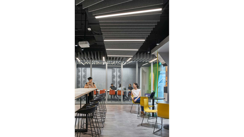 A few people sitting at tables.