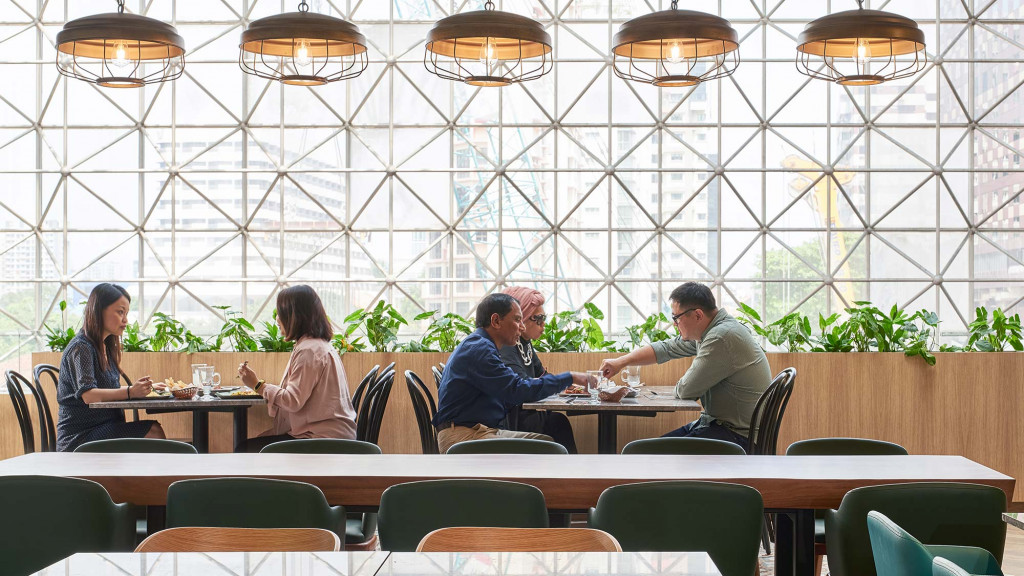 A group of people sitting at a table.