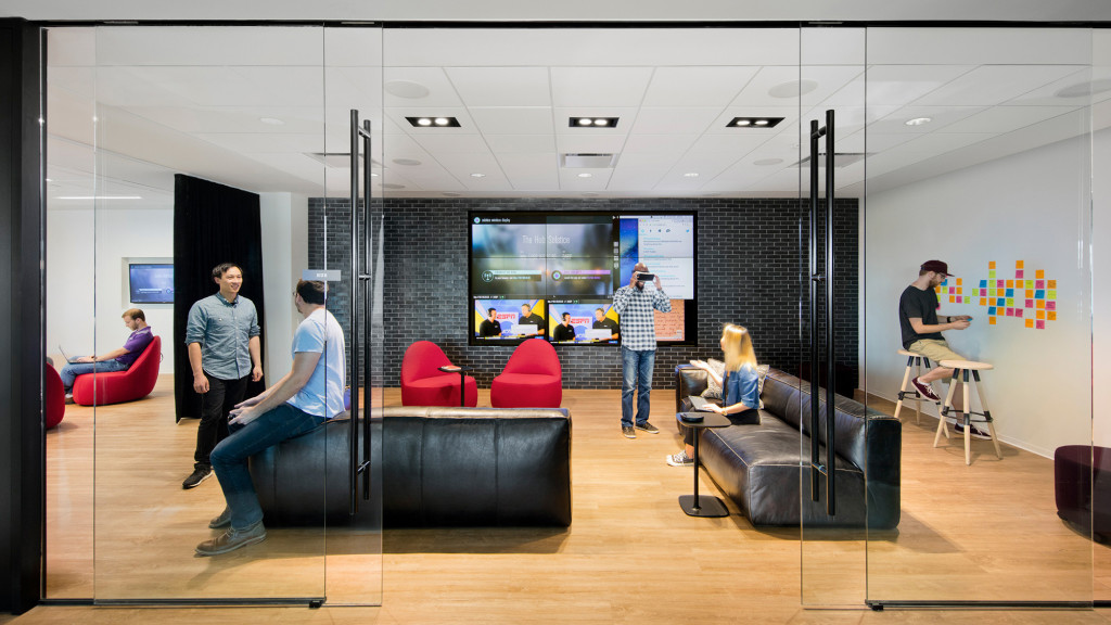 A group of people in a room.