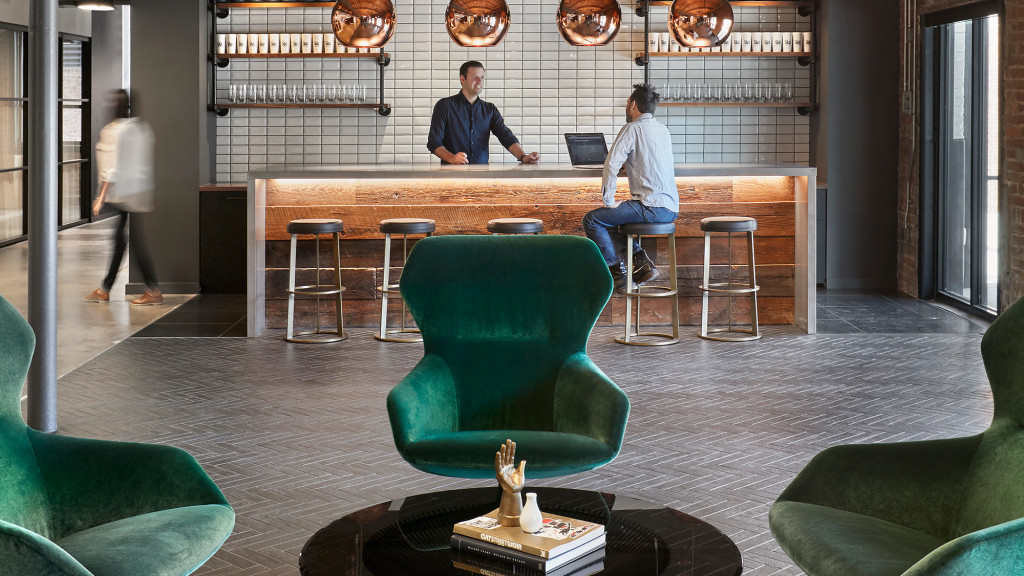 A person sitting at a bar.