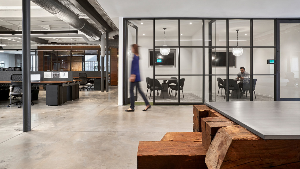 A person walking in a large room.