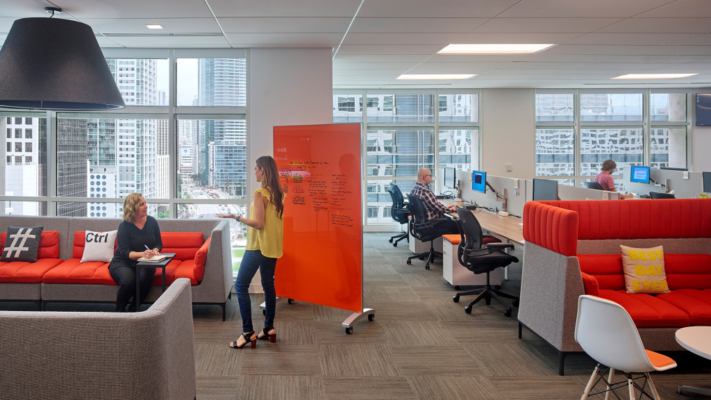 A group of people in an office.