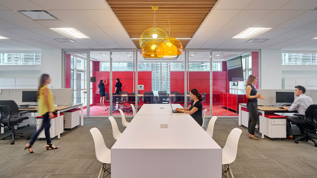 A group of people in an office.