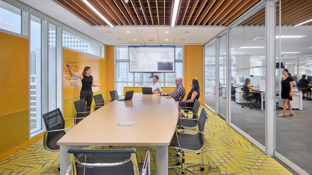 A group of people in a conference room.