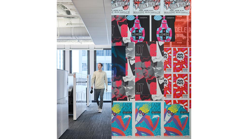 A person walking in a hallway.