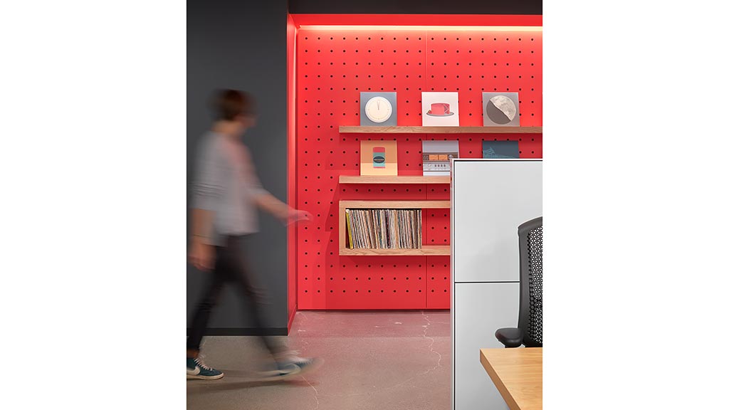 A person walking in a room.