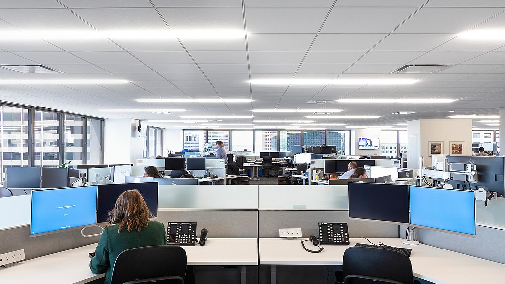 A group of people in an office.