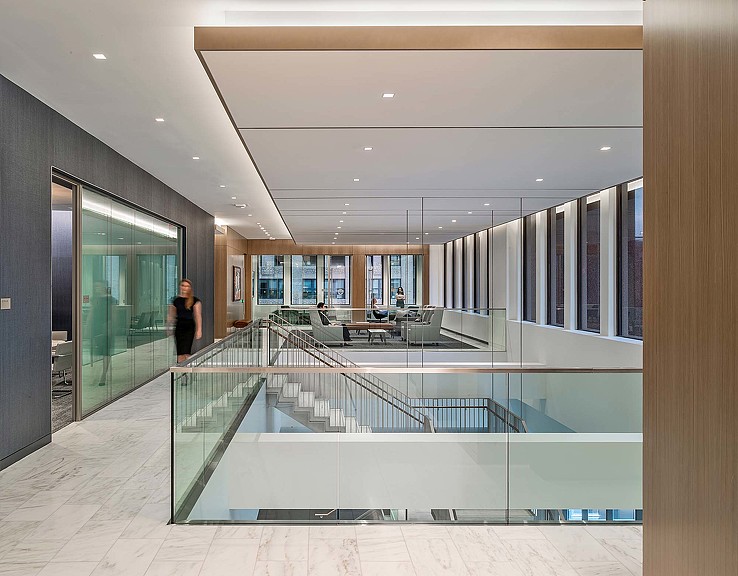 A person standing in a large room.