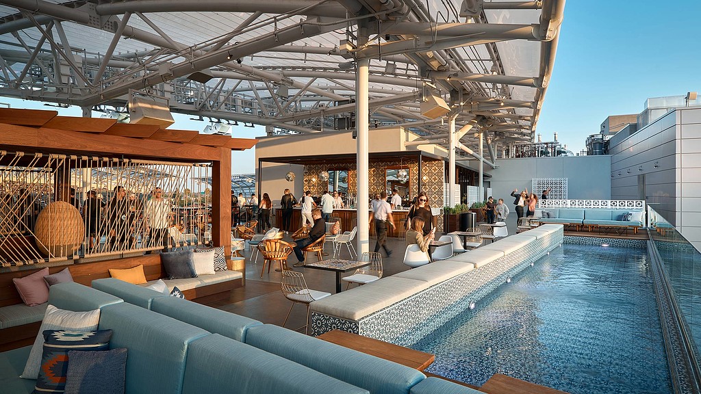 A pool with people in it.