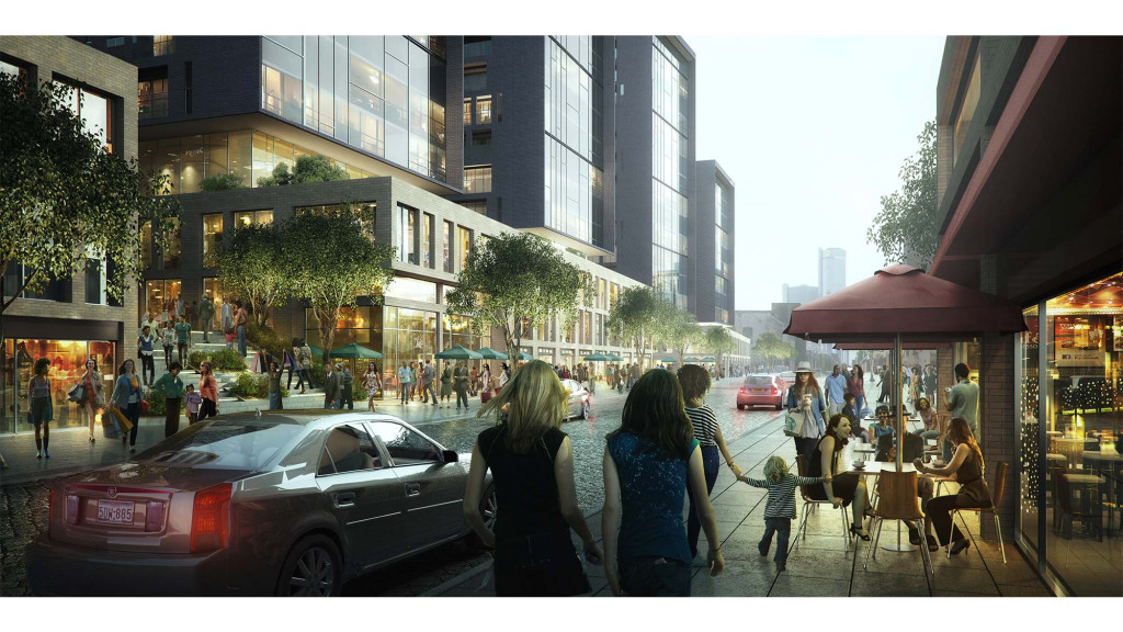 A group of people walking on a street with buildings and cars.
