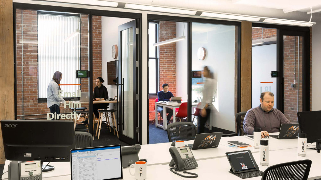 A group of people in an office.