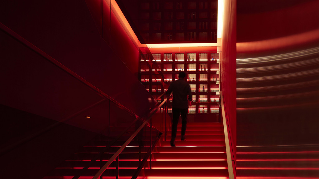 A person walking up a staircase.