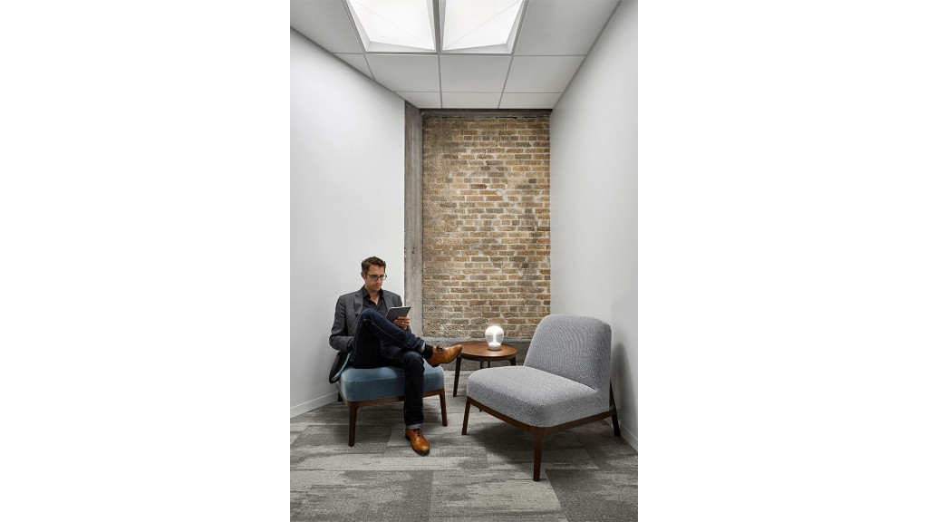 A person sitting in a chair.