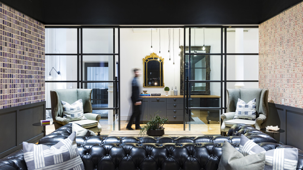 A person walking in a living room.