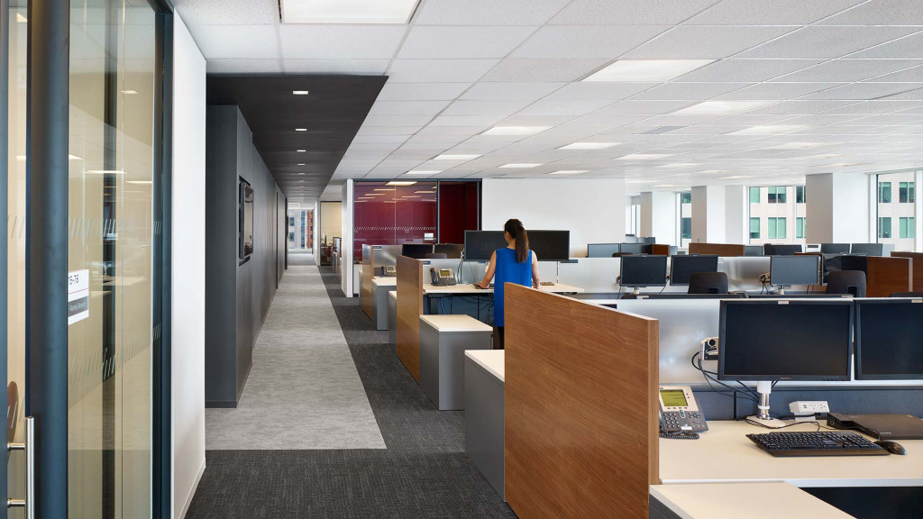 A person standing in an office.