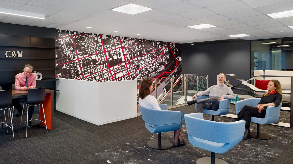 A group of people sitting in chairs.