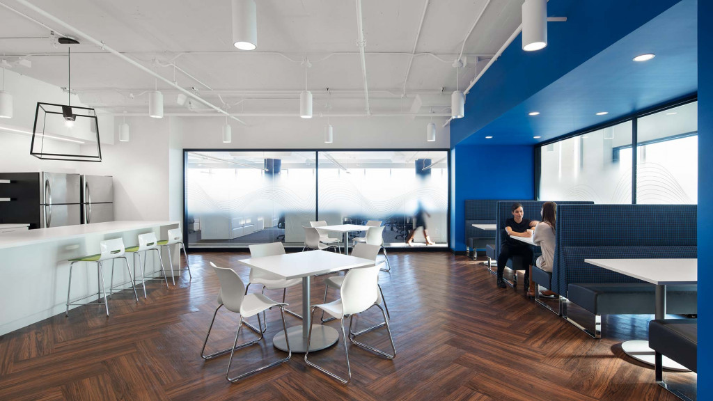 A room with tables and chairs.