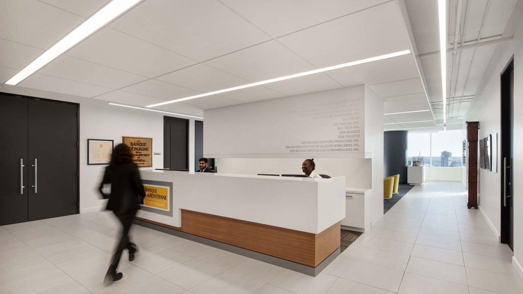 A person walking in a large room.