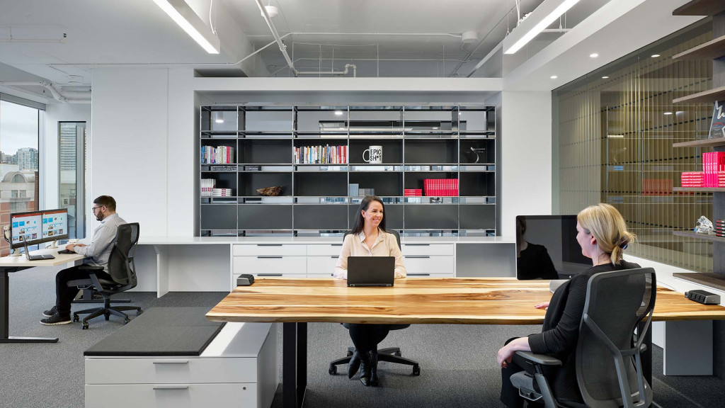 A few people in an office.