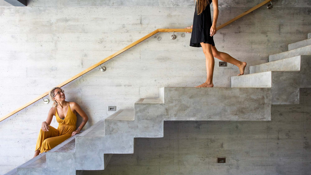 A person sitting on stairs.