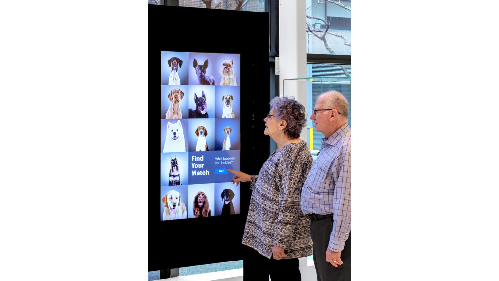 A man and woman kissing.