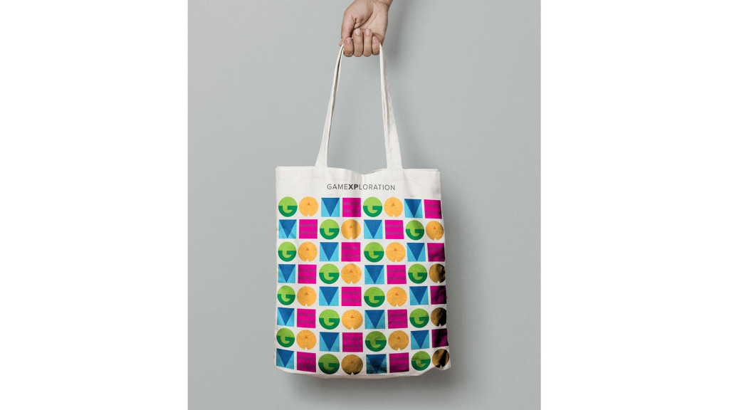 A hand holding a bag.