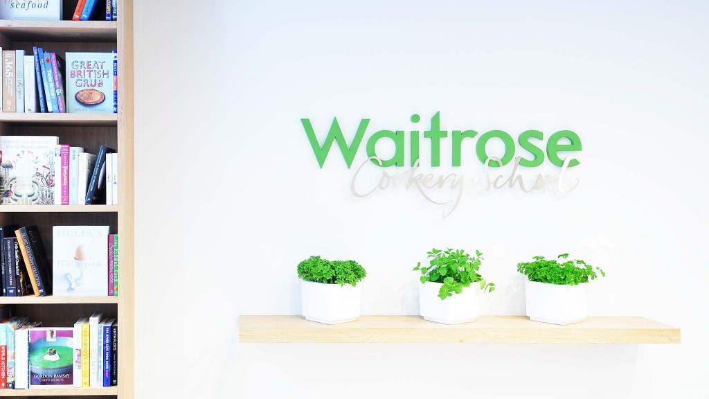 A shelf with plants on it.