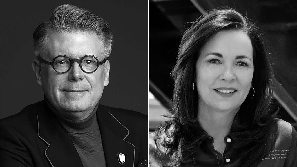 A man and woman smiling.