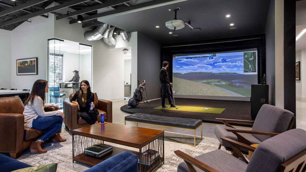 A group of people in a room.