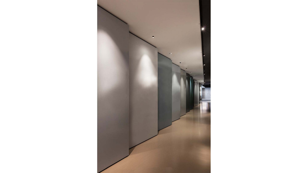 A hallway with white walls.