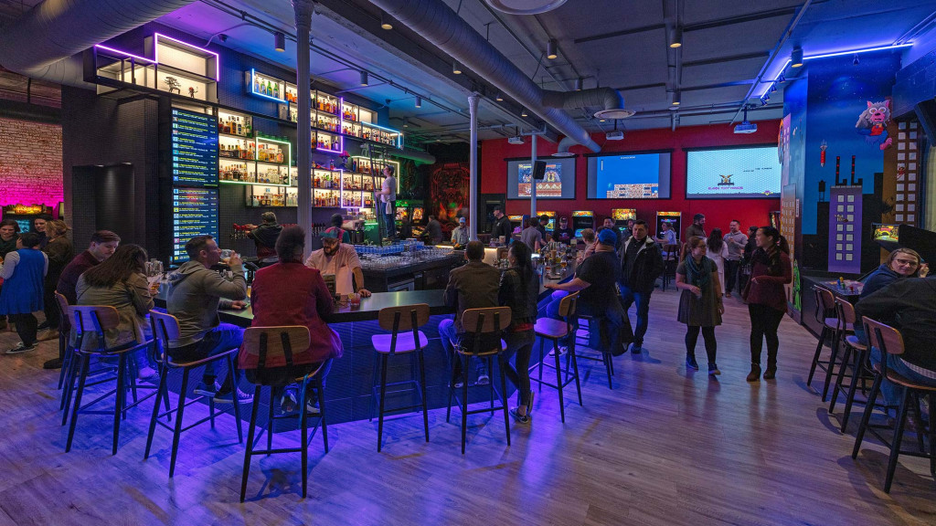 A group of people sitting at tables.