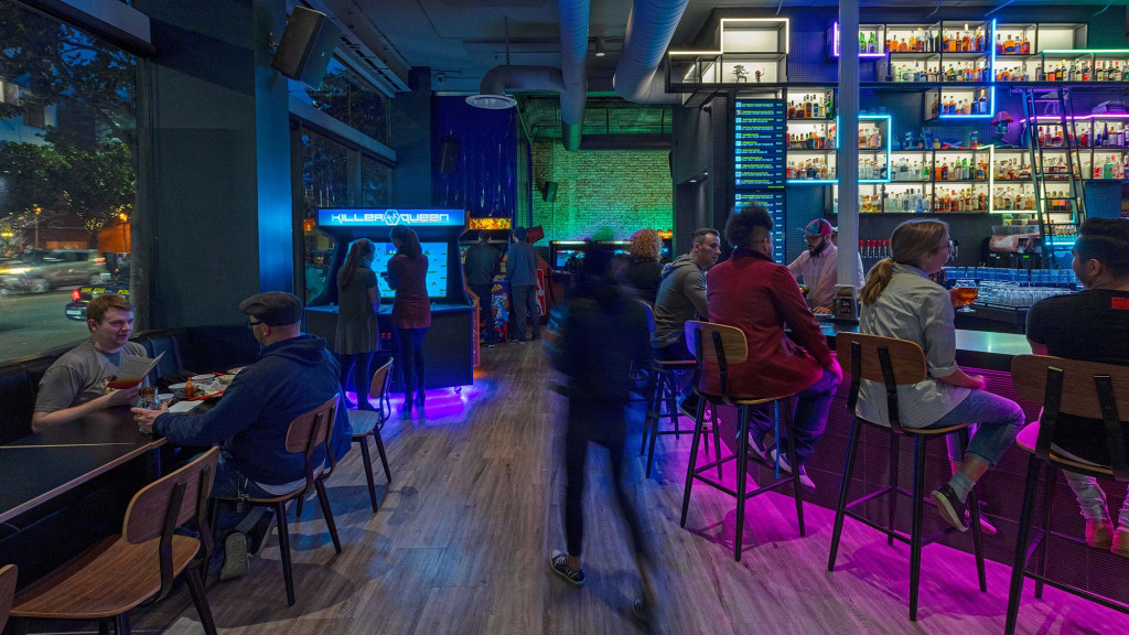 People sitting at tables in a restaurant.